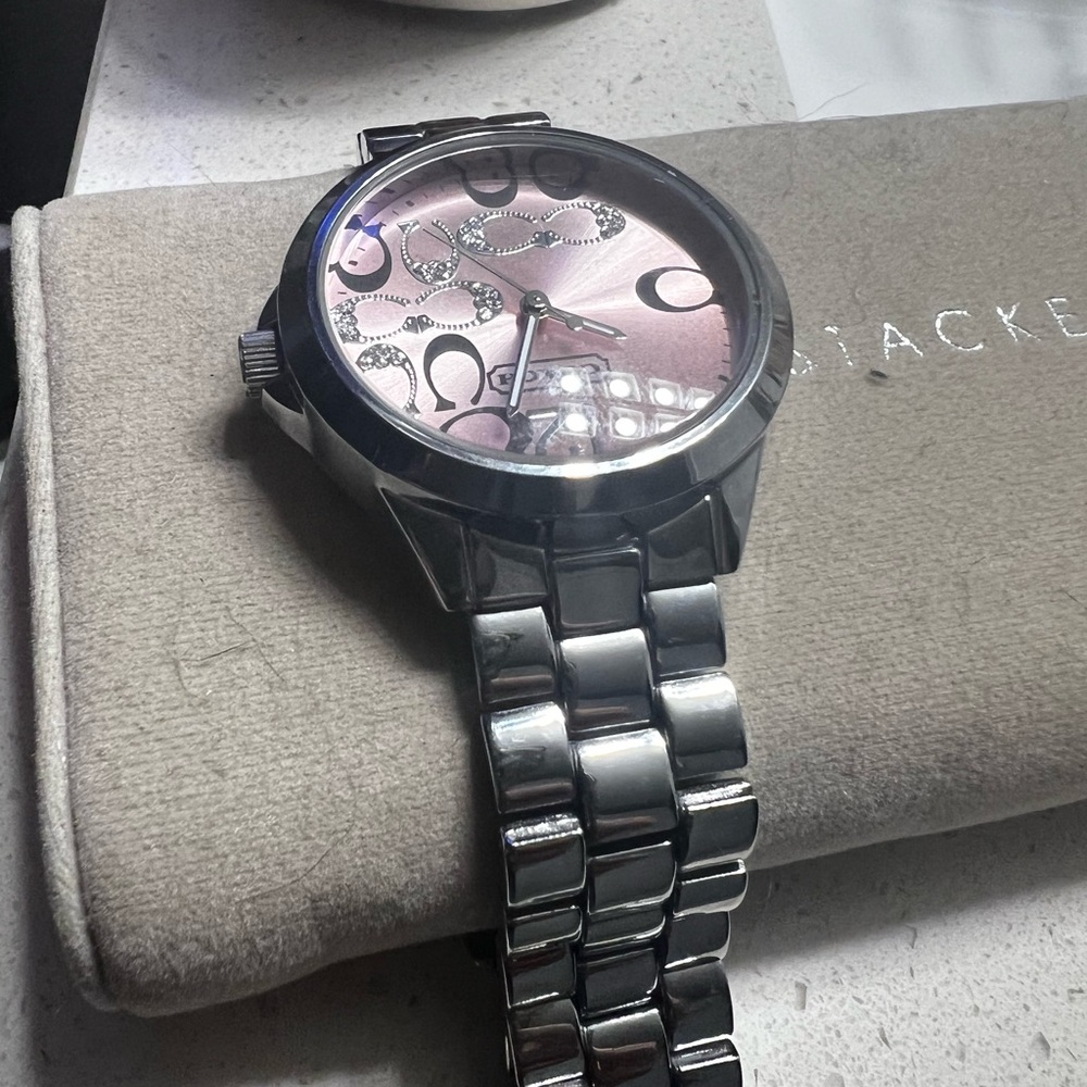 Women’s Coach watch with pink face